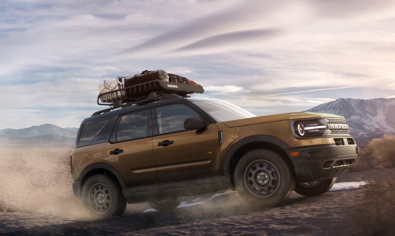 2022 Ford Bronco Sport driving in desert with luggage rack